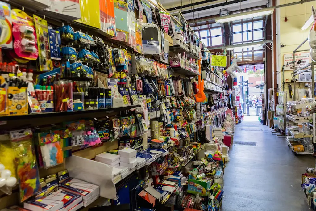 Walkway through market lined with stalls