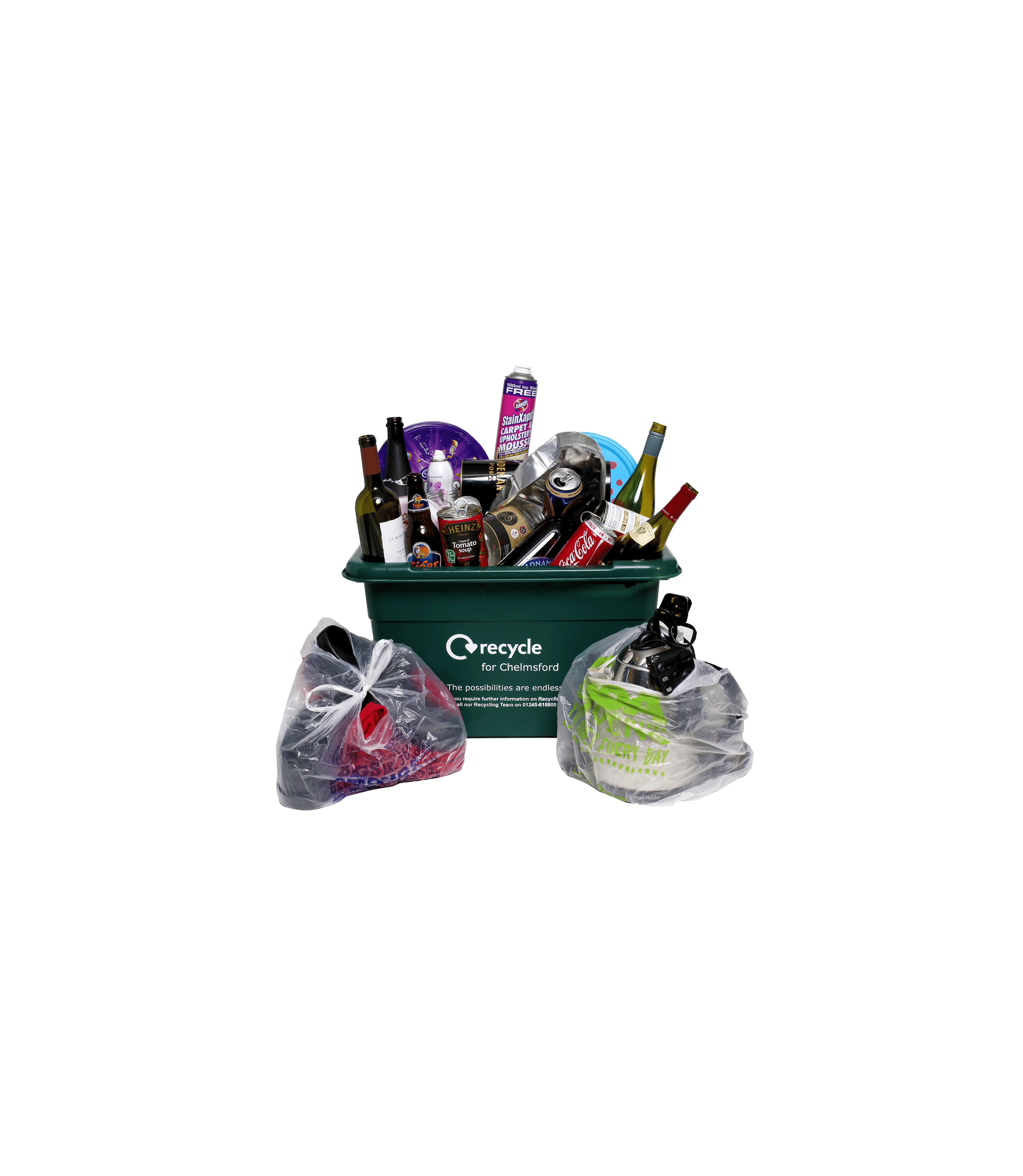 Green crate full of items to be recycled, such as glass bottles and tin cans