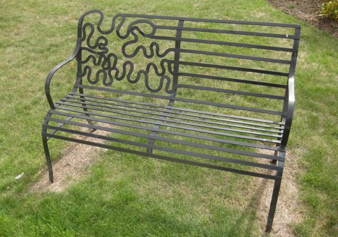 Decorative wrought iron bench