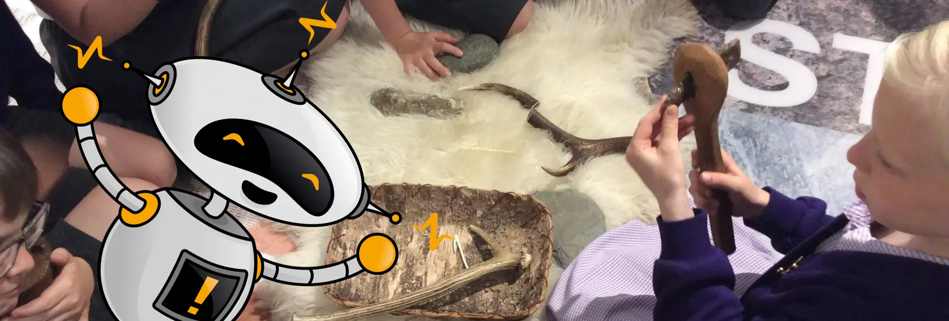 Children playing with stone age historic items