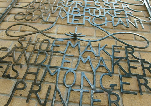Words formed out of metal to describe local historic trades