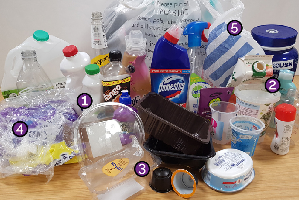 A collection of plastic items that we can recycle, such as bottles, rigid packaging, food trays, cling film and carrier bags