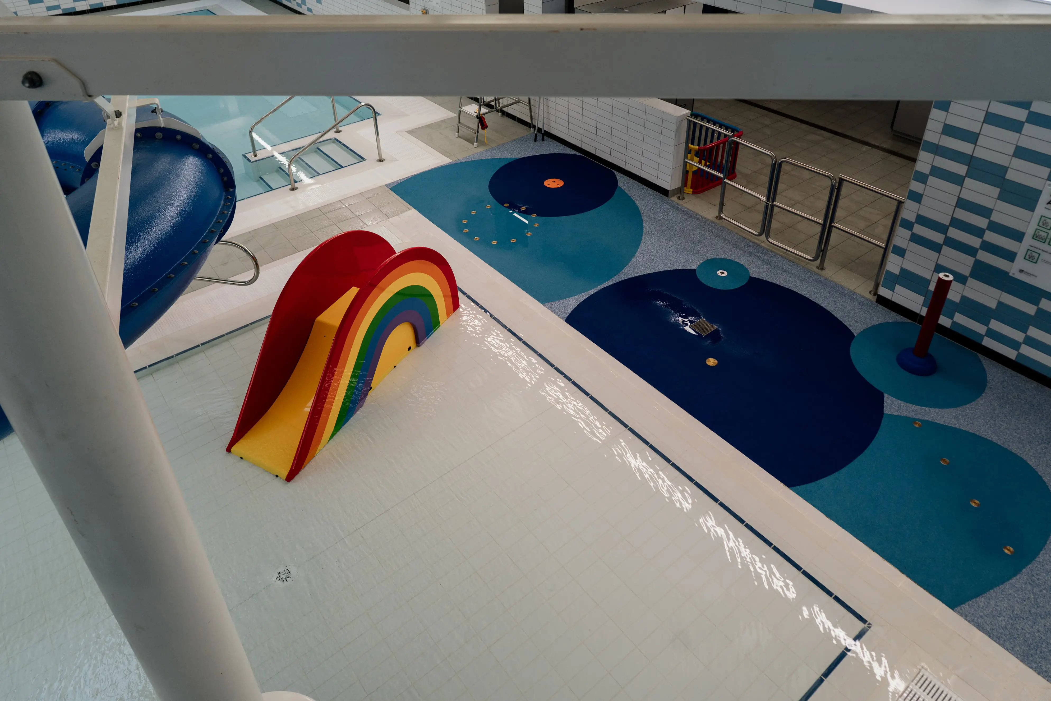 Sensory splash area with rainbow slide