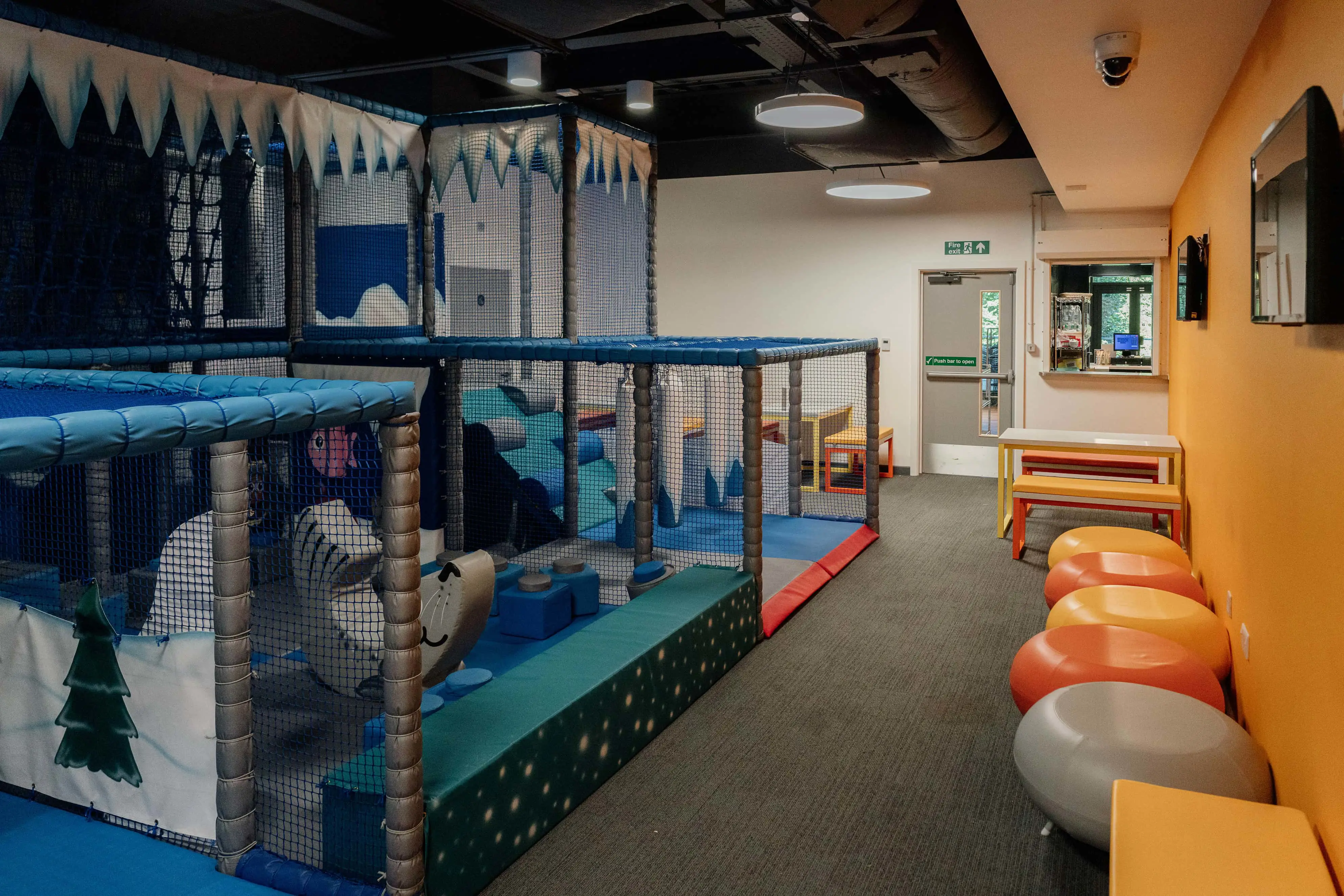 Soft play area with seating running alongside