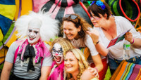 Fling attendees with some people wearing crazy clown facepaints preview