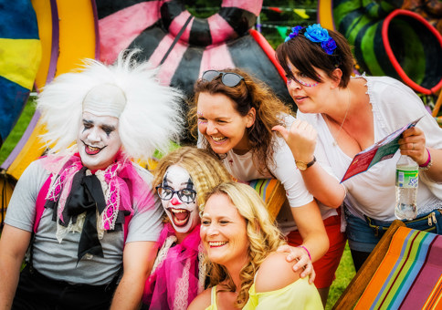 Fling attendees with some people wearing crazy clown facepaints