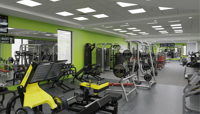 A digitally rendered image of how the CSAC gym should look once refurbished, showing rows of weights machines and a free weights area against a mirrored wall. The room is brightly lit with large square downlights. preview