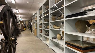 Shelves of pottery inside the Museum of Chelmsford store. 