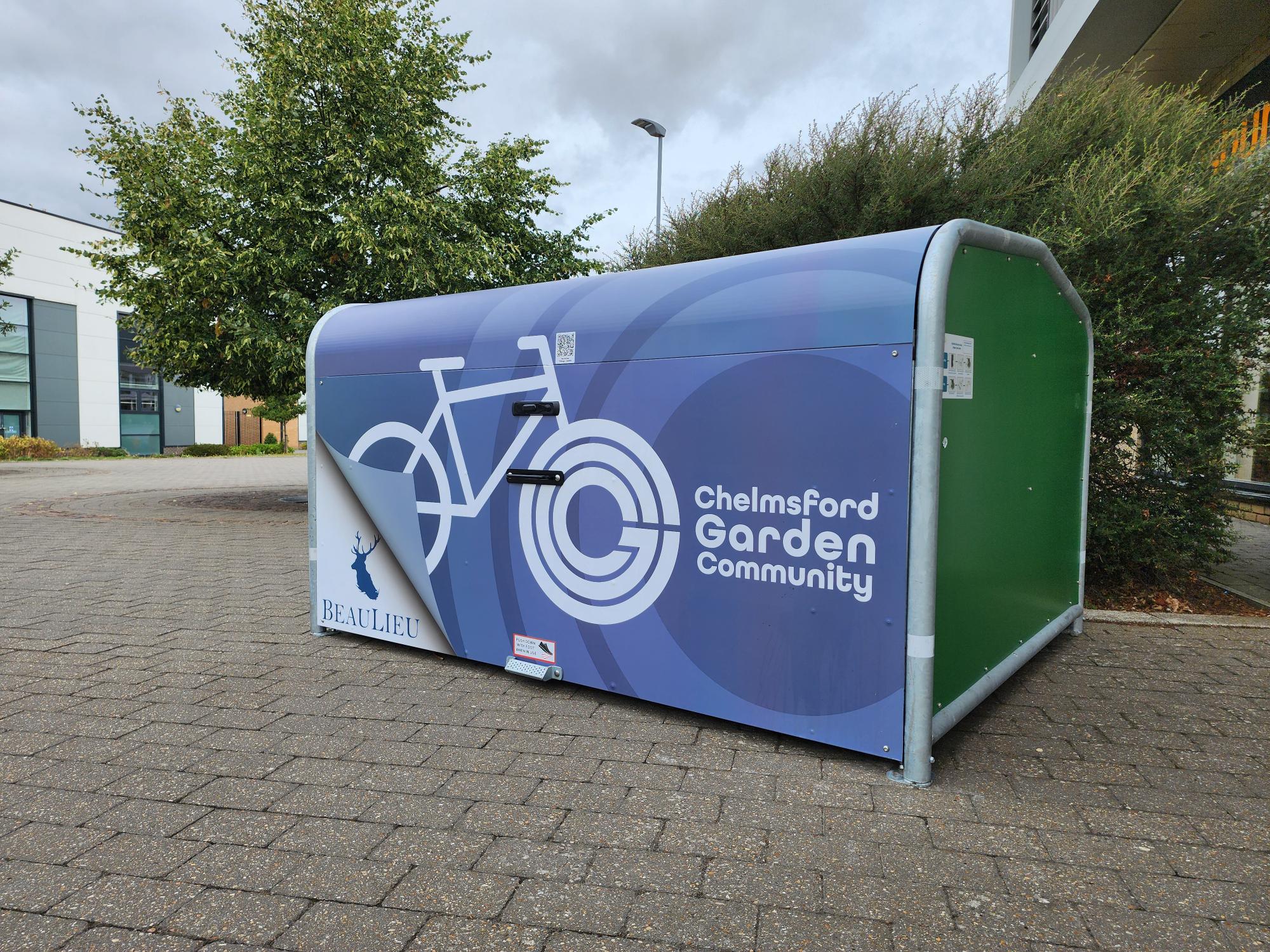 Large blue secure metal pod for cycle parking