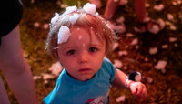Small boy with foam in his hair preview