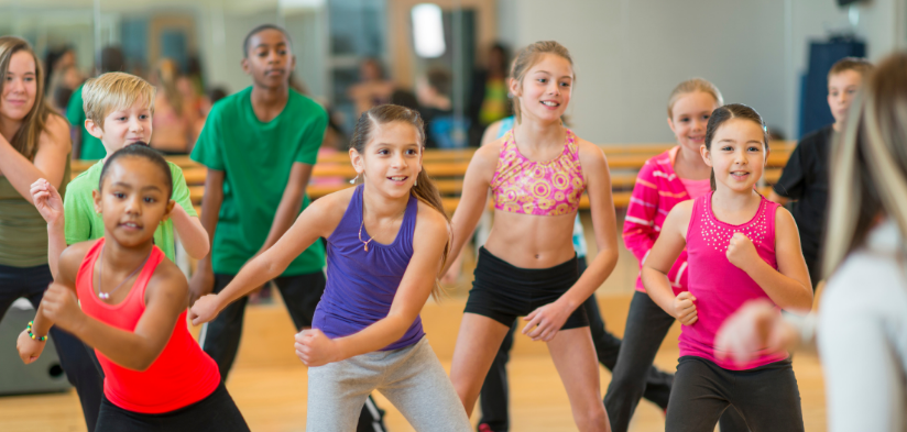 Group of children practicing in a dance studio