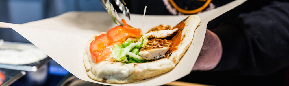 Stall holder serving up street food