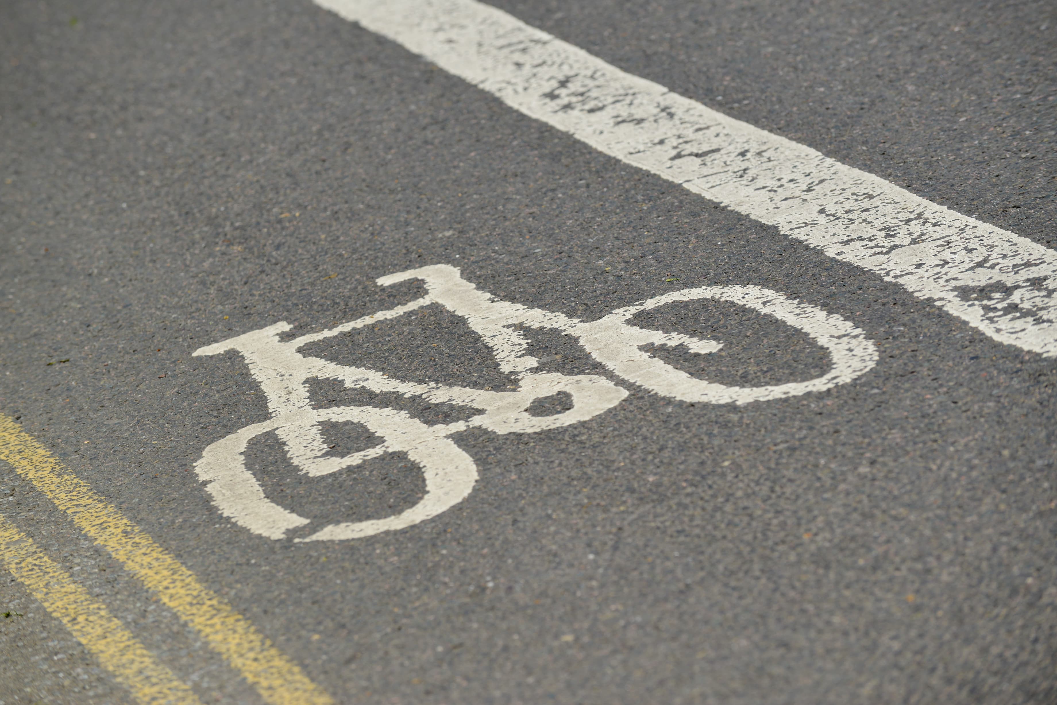Bike logo on cycling lane in road