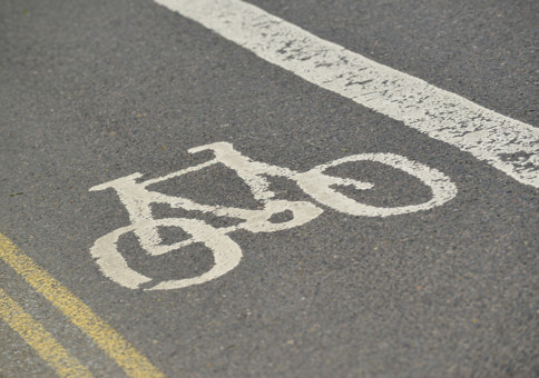 Bike logo on cycling lane in road