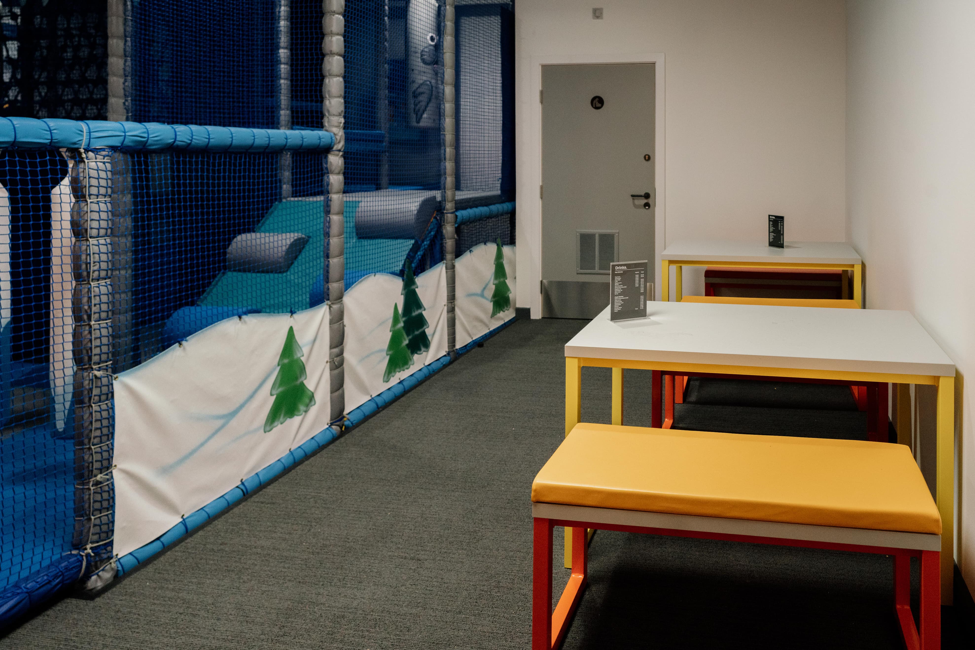 Soft play area with seating running alongside