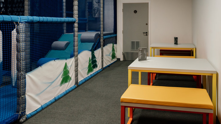 Soft play area with seating running alongside