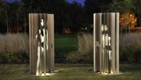 Two stainless steel figures in the grounds of ARU preview