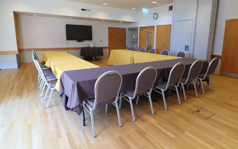 The Wells Suite set up with a u-shaped table. 