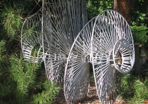 Steel sculpture in a woodland setting