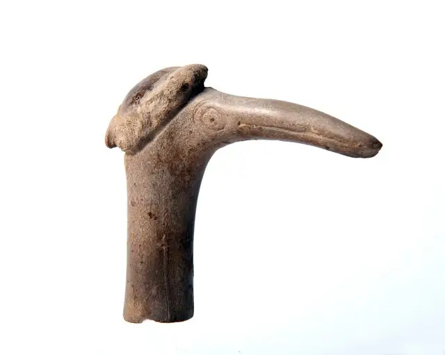 Antler carved into the caricature of a monk