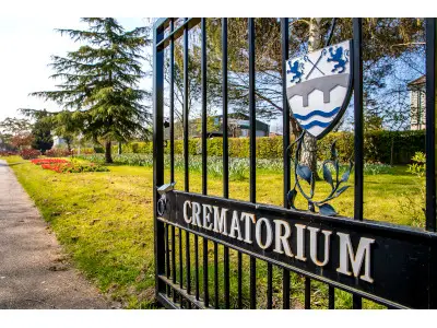Black, wrought iron gate with Chelmsford coat of arms