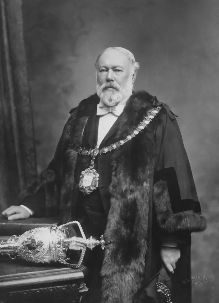 Man with robes and regalia of Mayoralty
