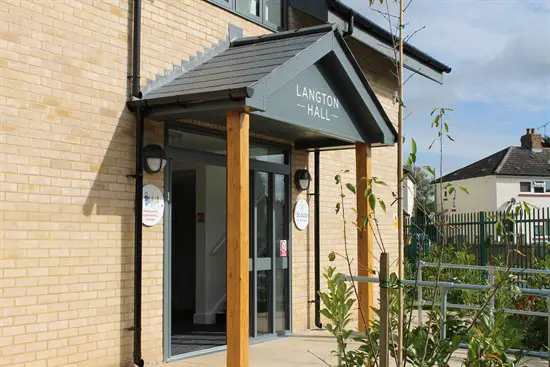 Front entrance with canopy saying "Lanton Hall"