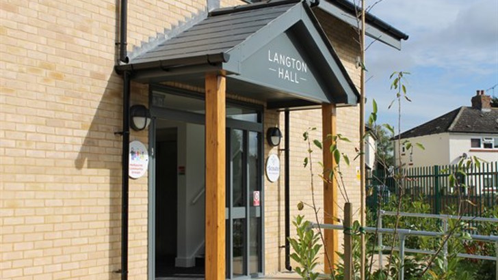 Front entrance with canopy saying "Lanton Hall"