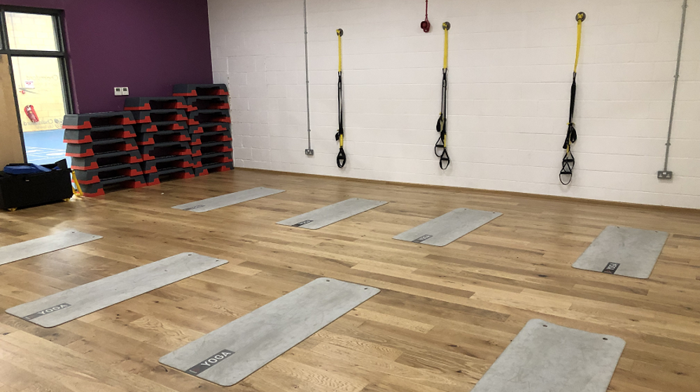 Exercise studio with mats laid out ready for a class