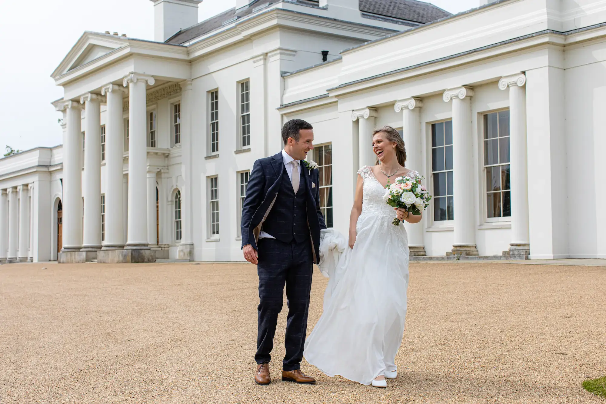 Wedding couple outside Hylands House