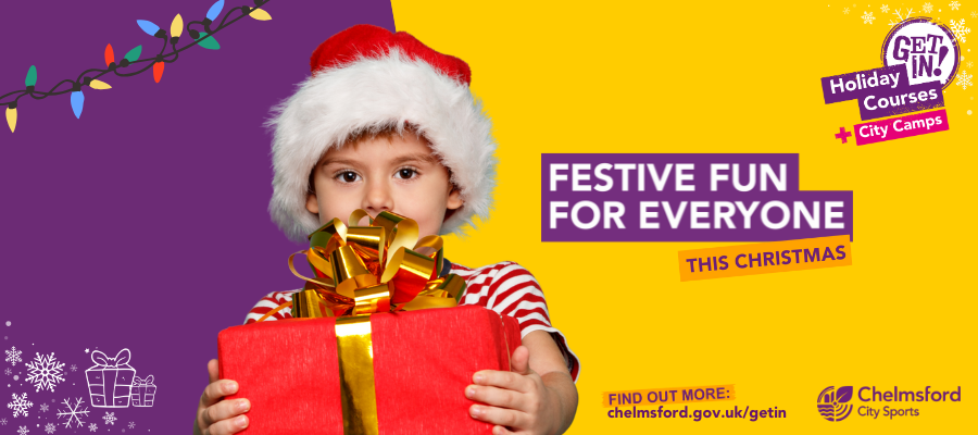Festive fun for everyone this Christmas. (Boy in Santa hat holding rd present with gold bow)