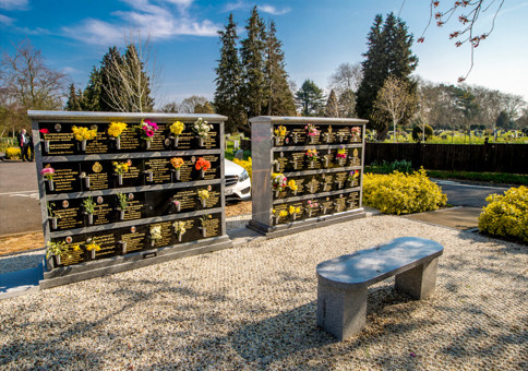 Large stone containers with niches for individual remains