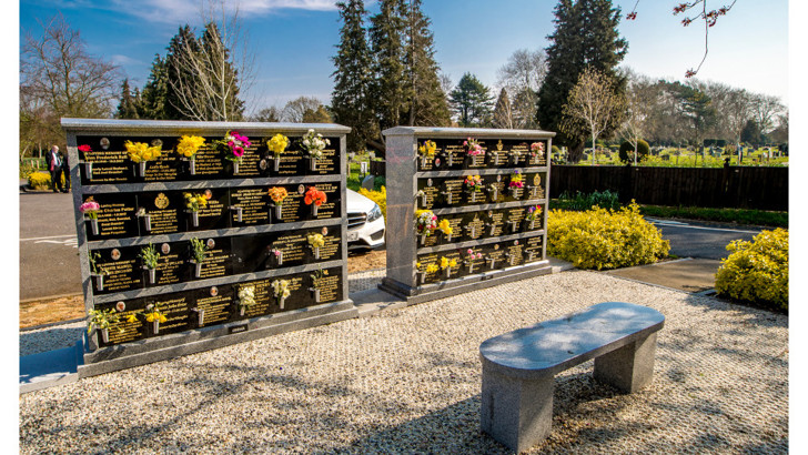 Large stone containers with niches for individual remains
