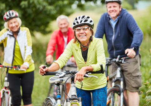 Group of older people with bikes
