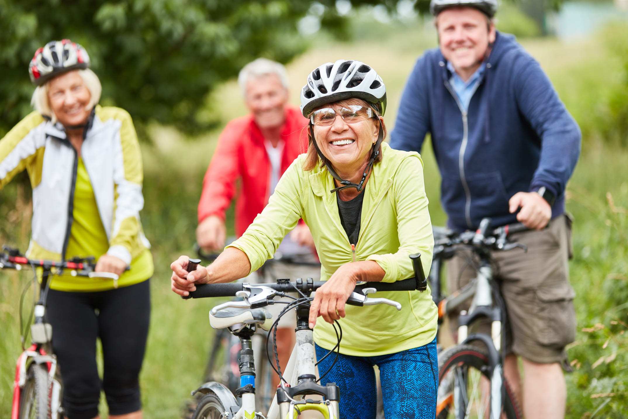 Group of older people with bikes