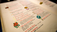 Page from Book of Remembrance, featuring hand written memorials preview