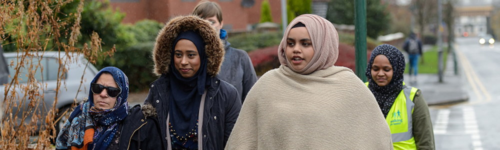 Group of ladies on a walk in a suburban area