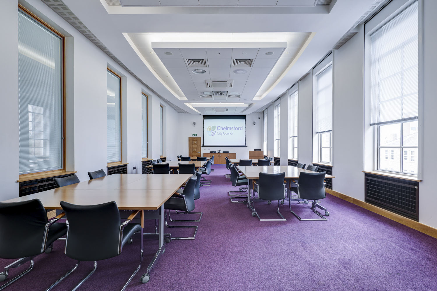 Meeting room set up with break-out tables