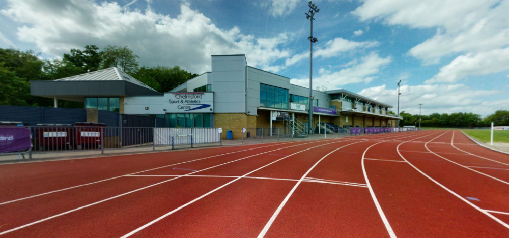 Red athletics track overlooked by the centre