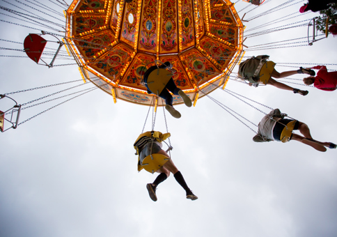People riding chairoplanes