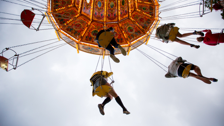 People riding chairoplanes