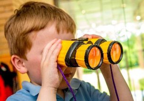  Boy using binoculars