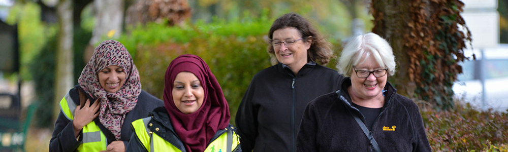 Group od ladies walking in a suburban area