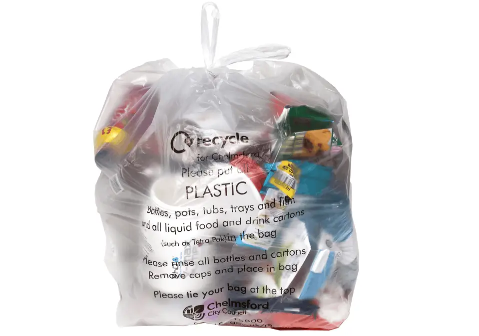 Clear plastic sack full of items to be recycled