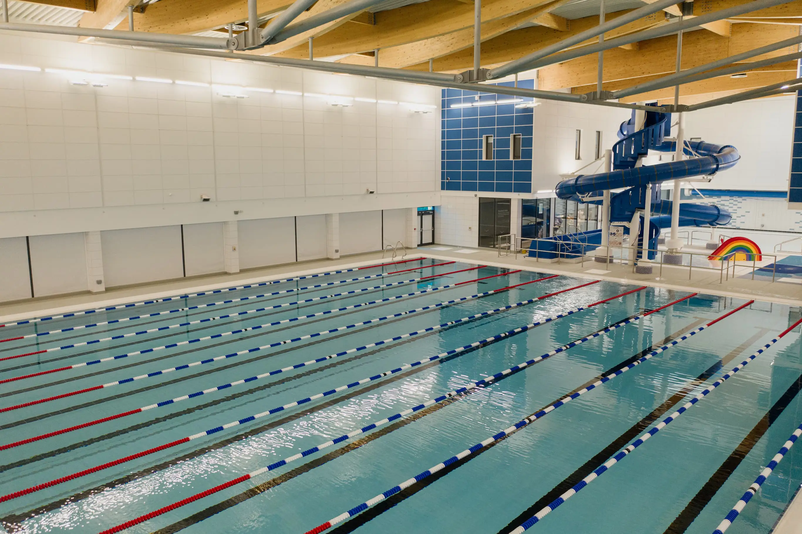 Main pool with lane ropes with flume in background