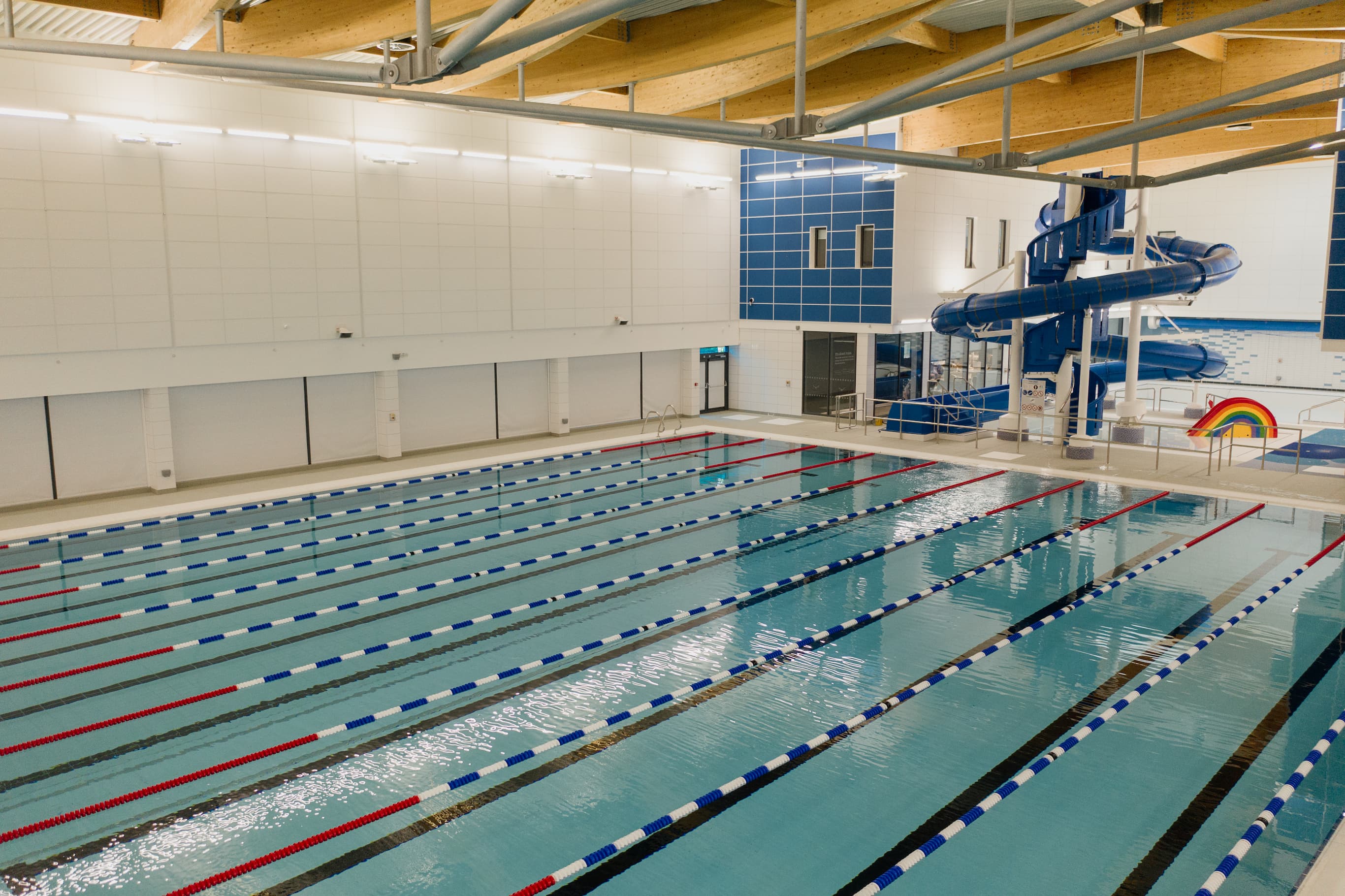 Main pool with lane ropes with flume in background preview