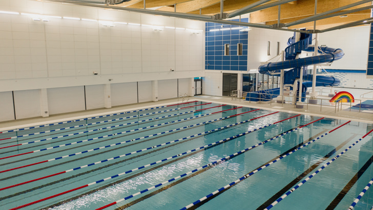 Main pool with lane ropes with flume in background