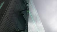 Top of a tall building with glass down the side preview