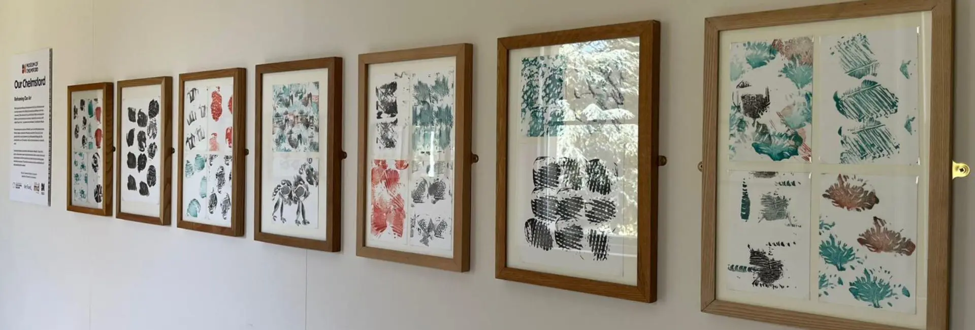 Various prints on the Our Chelmsford gallery wall. 