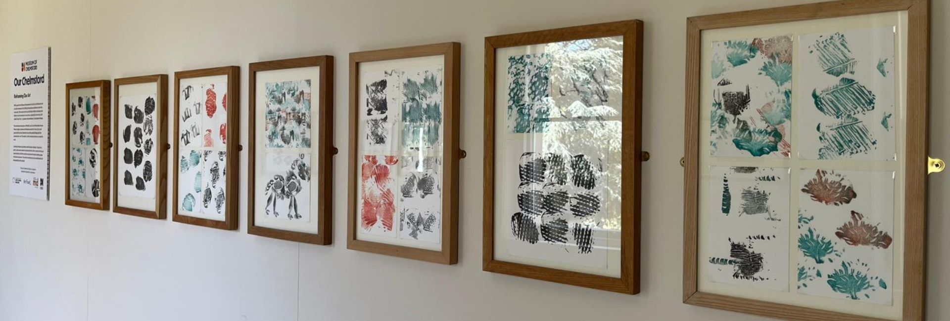 Various prints on the Our Chelmsford gallery wall.